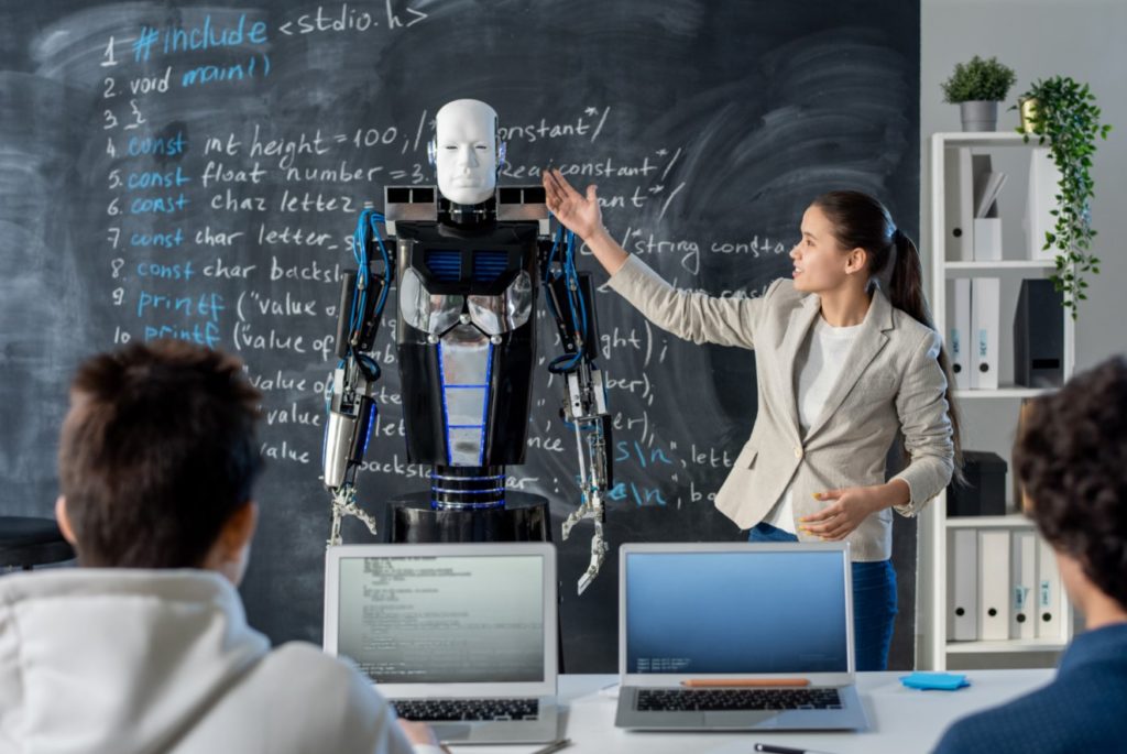 programadores desarrolladores robot aprendizaje 