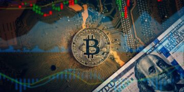 Golden bitcoin cryptocurrency on computer electronic circuit board., Bitcoin and microchip concept.